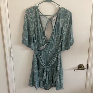 Princess Polly floral teal faux wrap romper